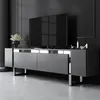 A modern living room with a TV and media console. Voir les images du produit