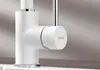 A close-up view of a white kitchen faucet with a silver handle. Náhľad obrázku produktu