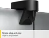 A close-up of a black webcam clipped to the edge of a silver laptop screen. Produktbild-Vorschau