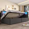 A bedroom with a bed that has its storage compartment open, revealing the mattress slats and LED lighting. Náhľad obrázku produktu