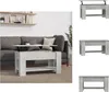 A lift-top coffee table is shown in a living room setting next to a sofa. Náhľad obrázku produktu
