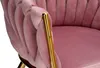 Close-up of a pink velvet armchair with gold accents. Produktbild-Vorschau