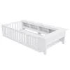 A white children's bed with a slatted base and a built-in bookshelf along one side. Náhľad obrázku produktu