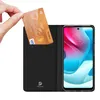 A hand inserts a credit card into a black phone case with a built-in card holder, next to a smartphone. Podgląd zdjęcia produktu