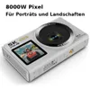 A white digital camera with text overlays and a screen displaying an image. Produktbild-Vorschau