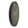 A side view of a round wall clock with a black frame and a dark gray face decorated with stars and planets. Náhled obrázku produktu