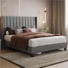 A bedroom scene with a bed and bedding. Produktbild-Vorschau