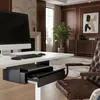 A home office setting with a desk, computer, and a leather chair. Voir les images du produit