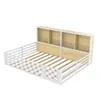 A 3D rendering of a white metal bed frame with a wooden headboard featuring shelves, set against a white background. Náhled obrázku produktu