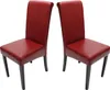 Two red dining chairs with dark legs are shown against a white background. Podgląd zdjęcia produktu