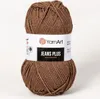 A ball of brown yarn with a label. Podgląd zdjęcia produktu