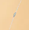 A close-up of a single LED light on a string of lights. Voir les images du produit