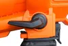 A close-up view of an orange and black lever mechanism on a piece of equipment, possibly a leaf blower or vacuum. Produktbild-Vorschau
