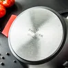 Close-up of the bottom of a pot with brand logo and symbols. Podgląd zdjęcia produktu
