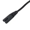 A close-up shot of a black power cord connector. Produktbild-Vorschau
