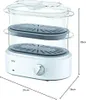 A white Braun steam cooker with two transparent steaming baskets and a transparent lid, shown with dimensions indicated by lines and text. Voir les images du produit