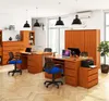 An office setting with multiple desks and chairs. Produktbild-Vorschau