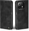 A black flip case for a smartphone, shown from two angles. Produktbild-Vorschau