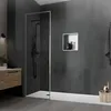 A modern bathroom with a sleek shower enclosure and a wooden vanity. Náhled obrázku produktu