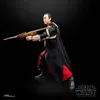 A Star Wars Black Series action figure of Chirrut Imwe holding a rifle, posed against a black background. Produktbild-Vorschau