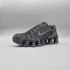 A black Nike Shox TL sneaker is shown against a plain gray background. Produktbild-Vorschau