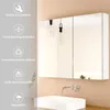 A bathroom vanity with a mirror cabinet and sink. Voir les images du produit