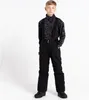 A young boy stands in front of a white background wearing ski pants and a patterned fleece. Produktbild-Vorschau