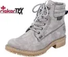 A gray lace-up boot with a tan sole, shown against a white background. The RiekerTEX logo is visible in the upper left corner. Anteprima dell’immagine prodotto