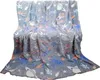 A folded blanket with a space-themed pattern. Náhled obrázku produktu