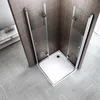 A modern shower cabin with glass doors and a white base, set in a bathroom with tiled walls and floor. Produktbild-Vorschau