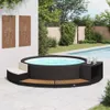 A whirlpool surround with seating and a side table next to a swimming pool. Produktbild-Vorschau