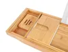A close-up view of a wooden bath tray with a soap dish and a slot for a tablet or book. Náhľad obrázku produktu
