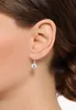 A close-up shot of a woman's ear wearing a single earring. Produktbild-Vorschau