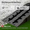 A close-up view of a black ramp with textured surface, placed on gravel and grass. Text overlays highlight features. Produktbild-Vorschau