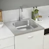 A stainless steel kitchen sink with a faucet and a drying rack is shown on a white countertop. Náhľad obrázku produktu