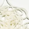 A close-up view of white, translucent, tube-like objects. Náhľad obrázku produktu