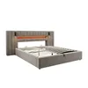 A modern upholstered bed frame with a headboard featuring integrated LED lighting. Produktbild-Vorschau