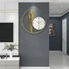 A modern living room with a stylish wall clock. Produktbild-Vorschau