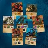A collection of game cards with fantasy creature illustrations, arranged on a blue textured surface. Produktbild-Vorschau