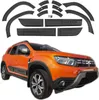 A set of car body kit accessories for a Dacia Duster, including fender flares and door protectors, displayed above the car itself. Náhľad obrázku produktu