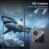 A smartphone screen displaying a shark in the ocean, with a close-up of a phone's camera module in the foreground. Produktbild-Vorschau