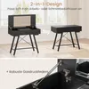 A split image showing a black vanity table in two configurations, with a close-up of a gas spring mechanism at the bottom. Podgląd zdjęcia produktu
