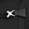 A close-up of a black backpack buckle. Náhled obrázku produktu