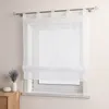 A white sheer Roman blind with embroidered wavy lines and beads is shown hanging on a window. Produktbild-Vorschau
