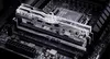 A close-up shot of a computer RAM module installed on a motherboard. Podgląd zdjęcia produktu