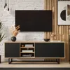 A modern living room setup featuring a TV stand with a television mounted above it. Produktbild-Vorschau