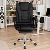 A black office chair is shown in a home office setting with bookshelves and a desk in the background. Produktbild-Vorschau