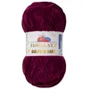 A ball of dark purple yarn with a white label. Náhled obrázku produktu