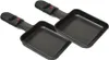 Two black raclette pans with black handles are shown against a white background. Produktbild-Vorschau