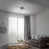 A modern living room with a large window, sofa, coffee table, and a ceiling light. Produktbild-Vorschau